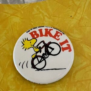 Woodstock "Bike It" Peanuts Pin - White, Yellow, Red